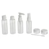 TROUSSE DE VOYAGE PVC ET 6 CONTENANTS VIDES TRANSPARENT BLAN
